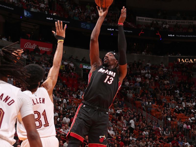 MIAMI, FL - MARCH 24: Bam Adebayo #13 of the Miami Heat shoots the ball during the game against the Cleveland Cavaliers on March 24, 2024 at Kaseya Center in Miami, Florida. NOTE TO USER: User expressly acknowledges and agrees that, by downloading and or using this Photograph, user is consenting to the terms and conditions of the Getty Images License Agreement. Mandatory Copyright Notice: Copyright 2024 NBAE (Photo by Issac Baldizon/NBAE via Getty Images)