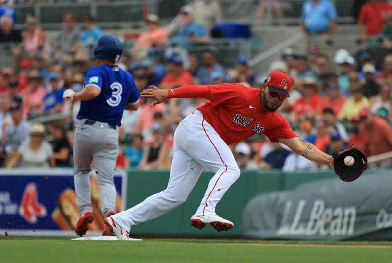 Feb 22, 2026; Fort Myers, Florida, USA;  Boston Red Sox first baseman Willson Contreras (40) catches the ball at first base after Toronto Blue Jays center fielder Myles Straw (3) was safe during the first inning at JetBlue Park at Fenway South. Mandatory Credit: Kim Klement Neitzel-Imagn Images