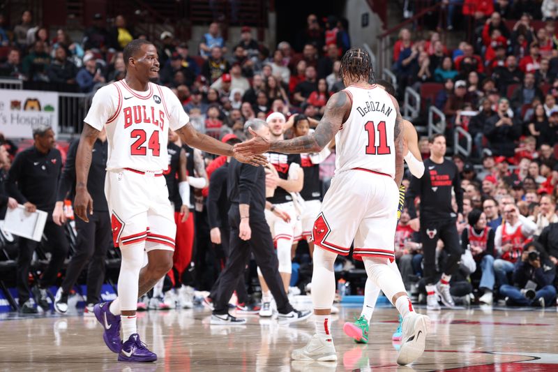 CHICAGO, IL - MARCH 27: Javonte Green #24 high fives DeMar DeRozan #11 of the Chicago Bulls during the game against the Indiana Pacers on March 27, 2024 at United Center in Chicago, Illinois. NOTE TO USER: User expressly acknowledges and agrees that, by downloading and or using this photograph, User is consenting to the terms and conditions of the Getty Images License Agreement. Mandatory Copyright Notice: Copyright 2024 NBAE (Photo by Jeff Haynes/NBAE via Getty Images)