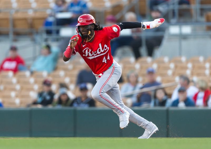 Mar 4, 2025; Phoenix, Arizona, USA; Cincinnati Reds shortstop Elly De La Cruz steals second base against the Los Angeles Dodgers during a spring training game at Camelback Ranch-Glendale. Mandatory Credit: Mark J. Rebilas-Imagn Images