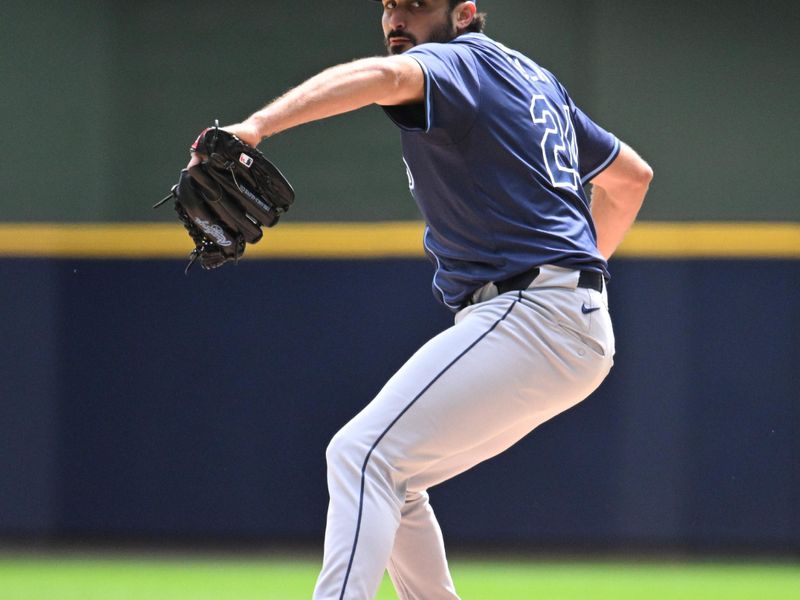 May 1, 2024; Milwaukee, Wisconsin, USA; Tampa Bay Rays starting pitcher Zach Eflin (24) delivers a pitch against the Milwaukee Brewers in the first inning at American Family Field. Mandatory Credit: Michael McLoone-USA TODAY Sports