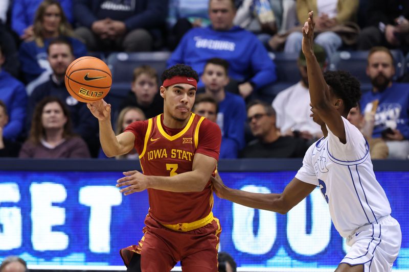 Jan 16, 2024; Provo, Utah, USA; Iowa State Cyclones guard Tamin Lipsey (3) passes the ball against Brigham Young Cougars guard Jaxson Robinson (2) during the first half at Marriott Center. Mandatory Credit: Rob Gray-USA TODAY Sports