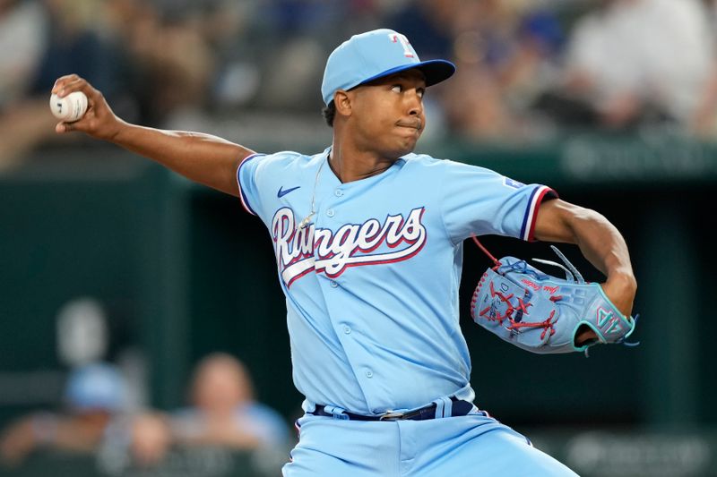 Aug 20, 2023; Arlington, Texas, USA; Texas Rangers relief pitcher Jose Leclerc (25) delivers a pitch to the Milwaukee Brewers during the seventh inning at Globe Life Field. Mandatory Credit: Jim Cowsert-USA TODAY Sports