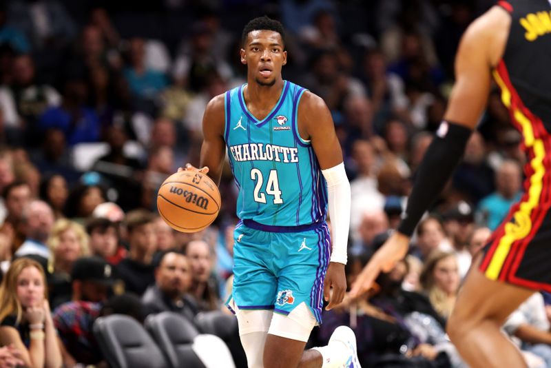 CHARLOTTE, NORTH CAROLINA - OCTOBER 25: Brandon Miller #24 of the Charlotte Hornets brings the ball down the court during the second half of a basketball game against the Atlanta Hawks at Spectrum Center on October 25, 2023 in Charlotte, North Carolina. NOTE TO USER: User expressly acknowledges and agrees that, by downloading and or using this photograph, User is consenting to the terms and conditions of the Getty Images License Agreement. (Photo by David Jensen/Getty Images)