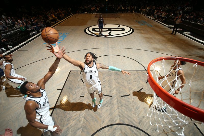 BROOKLYN, NY - MARCH 19: Trendon Watford #9 of the Brooklyn Nets rebounds the ball during the game against the New Orleans Pelicans on March 19, 2024 at Barclays Center in Brooklyn, New York. NOTE TO USER: User expressly acknowledges and agrees that, by downloading and or using this Photograph, user is consenting to the terms and conditions of the Getty Images License Agreement. Mandatory Copyright Notice: Copyright 2024 NBAE (Photo by Nathaniel S. Butler/NBAE via Getty Images)