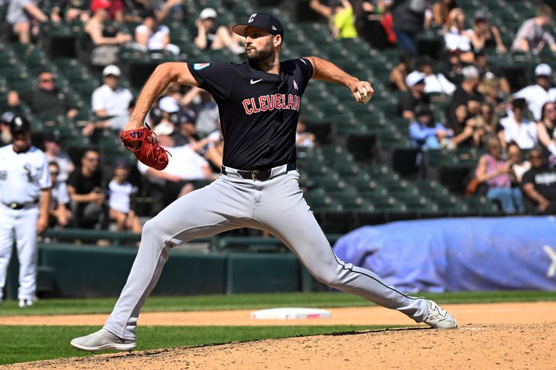 May 12, 2024; Chicago, Illinois, USA;  Cleveland Guardians pitcher Sam Hentges (31) delivers against the Chicago White Sox during the ninth inning at Guaranteed Rate Field. Mandatory Credit: Matt Marton-USA TODAY Sports