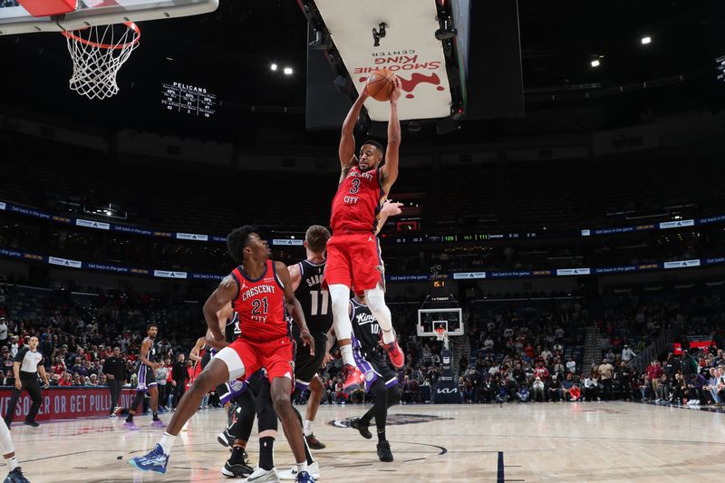 NEW ORLEANS, LA - DECEMBER 12: CJ McCollum #3 of the New Orleans Pelicans goes up for the rebound during the game against the Sacramento Kings on December 12, 2024 at the Smoothie King Center in New Orleans, Louisiana. NOTE TO USER: User expressly acknowledges and agrees that, by downloading and or using this Photograph, user is consenting to the terms and conditions of the Getty Images License Agreement. Mandatory Copyright Notice: Copyright 2024 NBAE (Photo by Layne Murdoch Jr./NBAE via Getty Images)