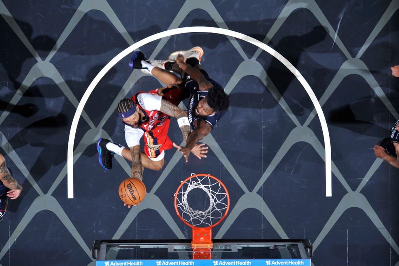 ORLANDO, FL - MARCH 21: Brandon Ingram #14 of the New Orleans Pelicans drives to the basket during the game against the Orlando Magic on March 21, 2024 at Amway Center in Orlando, Florida. NOTE TO USER: User expressly acknowledges and agrees that, by downloading and or using this photograph, User is consenting to the terms and conditions of the Getty Images License Agreement. Mandatory Copyright Notice: Copyright 2024 NBAE (Photo by Fernando Medina/NBAE via Getty Images)