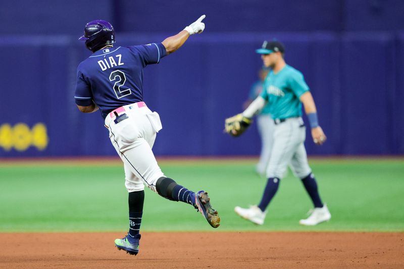 Sep 9, 2023; St. Petersburg, Florida, USA;  Tampa Bay Rays first baseman Yandy Diaz (2) celebrates after hitting  a walk off two-run home run against the Seattle Mariners in the ninth inning at Tropicana Field. Mandatory Credit: Nathan Ray Seebeck-USA TODAY Sports