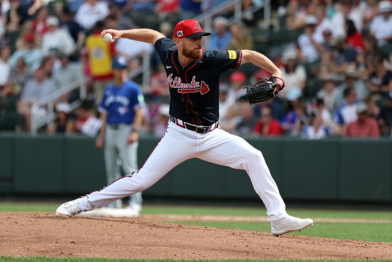 Mar 1, 2025; North Port, Florida, USA;  Atlanta Braves pitcher Chad Kohl (61) throws a pitch during the fourth inning ]against the Toronto Blue Jays at CoolToday Park. Mandatory Credit: Kim Klement Neitzel-Imagn Images