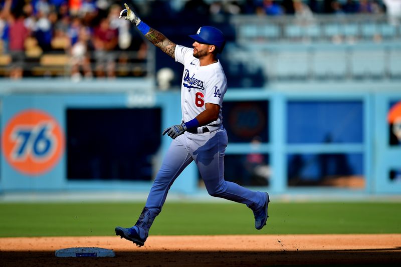 Jun 24, 2023; Los Angeles, California, USA; Los Angeles Dodgers left fielder David Peralta (6) rounds the bases after hitting a two run home run against the Houston Astros during the seventh inning at Dodger Stadium. Mandatory Credit: Gary A. Vasquez-USA TODAY Sports