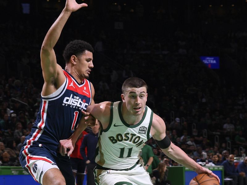 BOSTON, MA - APRIL 14: Payton Pritchard #11 of the Boston Celtics drives to the basket during the game  against the Washington Wizards on April 14, 2024 at the TD Garden in Boston, Massachusetts. NOTE TO USER: User expressly acknowledges and agrees that, by downloading and or using this photograph, User is consenting to the terms and conditions of the Getty Images License Agreement. Mandatory Copyright Notice: Copyright 2024 NBAE  (Photo by Brian Babineau/NBAE via Getty Images)