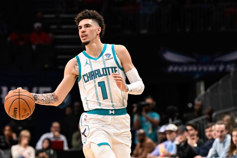 CHARLOTTE, NORTH CAROLINA - OCTOBER 15: LaMelo Ball #1 of the Charlotte Hornets brings the ball upcourt during the second quarter of his game against the Oklahoma City Thunder at Spectrum Center on October 15, 2023 in Charlotte, North Carolina. NOTE TO USER: User expressly acknowledges and agrees that, by downloading and or using this photograph, User is consenting to the terms and conditions of the Getty Images License Agreement.? (Photo by Matt Kelley/Getty Images)