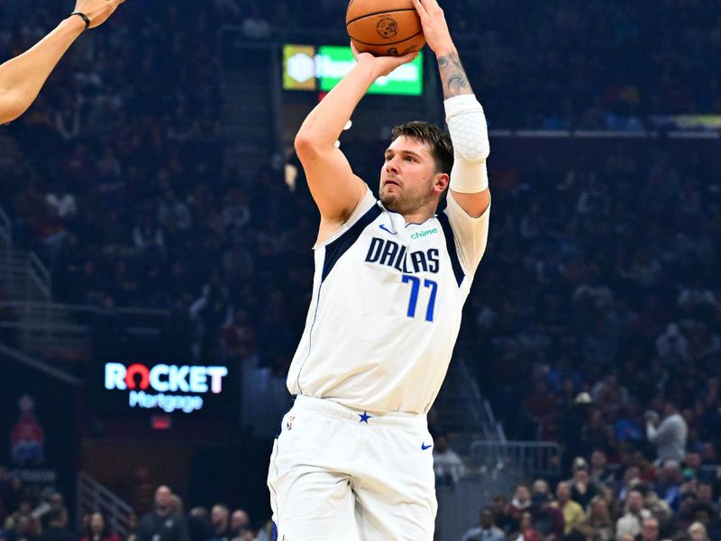 CLEVELAND, OHIO - FEBRUARY 27: Luka Doncic #77 of the Dallas Mavericks shoots a jump shot during the first quarter against the Cleveland Cavaliers at Rocket Mortgage Fieldhouse on February 27, 2024 in Cleveland, Ohio. NOTE TO USER: User expressly acknowledges and agrees that, by downloading and or using this photograph, User is consenting to the terms and conditions of the Getty Images License Agreement. (Photo by Jason Miller/Getty Images)