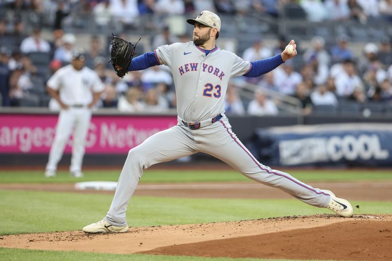 May 18, 2025; Bronx, New York, USA;  New York Mets starting pitcher David Peterson (23) pitches in the first inning against the New York Yankees at Yankee Stadium. Mandatory Credit: Wendell Cruz-Imagn Images