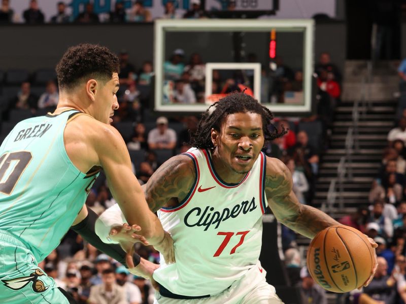 CHARLOTTE, NC - JANUARY 31:  Kevin Porter Jr. #77 of the LA Clippers during the game against the Charlotte Hornets on January 31, 2025 at Spectrum Center in Charlotte, North Carolina. NOTE TO USER: User expressly acknowledges and agrees that, by downloading and or using this photograph, User is consenting to the terms and conditions of the Getty Images License Agreement. Mandatory Copyright Notice: Copyright 2025 NBAE (Photo by Kent Smith/NBAE via Getty Images)