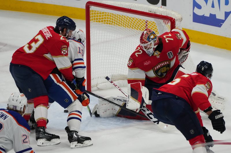 Jun 24, 2024; Sunrise, Florida, USA; Florida Panthers forward Carter Verhaeghe (23) defends against Edmonton Oilers forward Adam Henrique (19) during the first period in game seven of the 2024 Stanley Cup Final at Amerant Bank Arena. Mandatory Credit: Jim Rassol-USA TODAY Sports