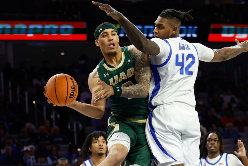 Mar 16, 2025; Fort Worth, TX, USA;  UAB Blazers forward Yaxel Lendeborg (3) looks to pass as Memphis Tigers forward Dain Dainja (42) defends during the first half at Dickies Arena. Mandatory Credit: Chris Jones-Imagn Images
