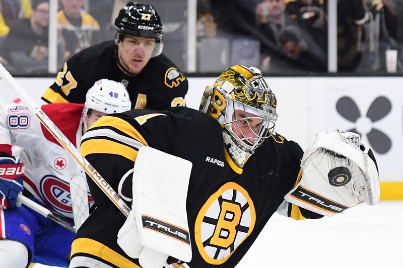 Dec 23, 2025; Boston, Massachusetts, USA; Boston Bruins goaltender Jeremy Swayman (1) makes a save during the second period against the Montréal Canadiens at TD Garden. Mandatory Credit: Bob DeChiara-Imagn Images