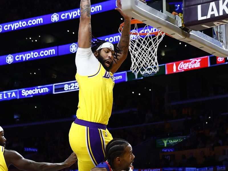 LOS ANGELES, CALIFORNIA - OCTOBER 20:  Anthony Davis #3 of the Los Angeles Lakers fouls Kawhi Leonard #2 of the LA Clippers in the third quarter at Crypto.com Arena on October 20, 2022 in Los Angeles, California.  NOTE TO USER: User expressly acknowledges and agrees that, by downloading and/or using this photograph, user is consenting to the terms and conditions of the Getty Images License Agreement.  (Photo by Ronald Martinez/Getty Images)