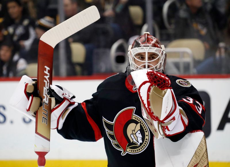 Jan 20, 2023; Pittsburgh, Pennsylvania, USA;  Ottawa Senators goaltender Cam Talbot (33) looks on during a time out against the Pittsburgh Penguins in the first period at PPG Paints Arena. Mandatory Credit: Charles LeClaire-USA TODAY Sports