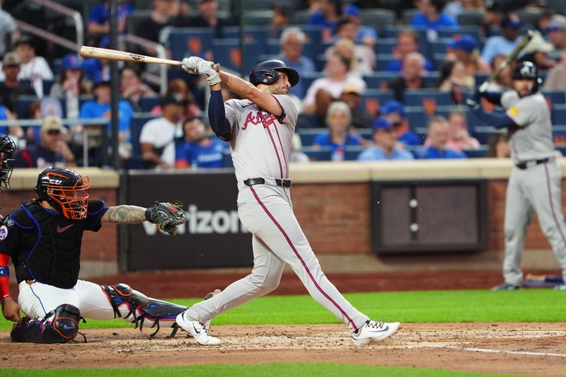 Jul 25, 2024; New York City, New York, USA; Atlanta Braves first baseman Matt Olson (28) hits a single against the New York Mets during the third inning at Citi Field. Mandatory Credit: Gregory Fisher-USA TODAY Sports