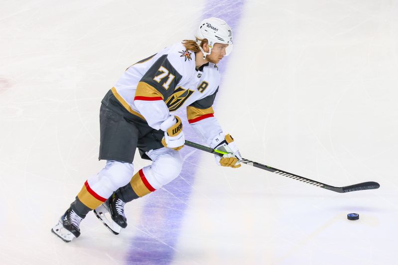 Mar 14, 2024; Calgary, Alberta, CAN; Vegas Golden Knights center William Karlsson (71) skates with the puck during the warmup period against the Calgary Flames at Scotiabank Saddledome. Mandatory Credit: Sergei Belski-USA TODAY Sports