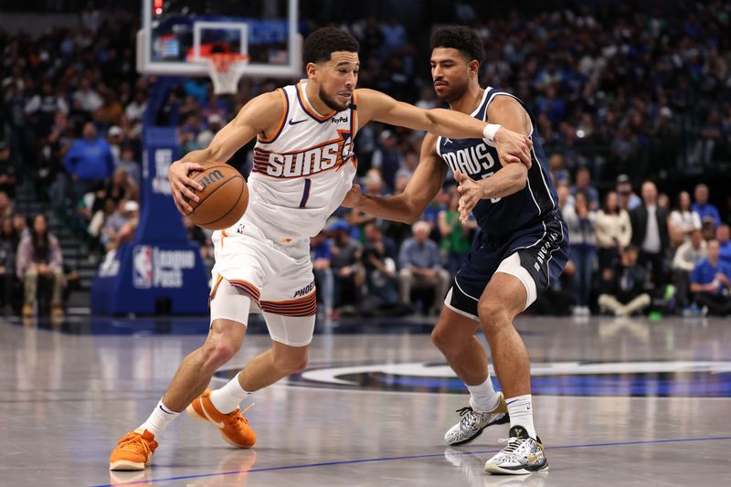 DALLAS, TEXAS - NOVEMBER 08: Devin Booker #1 of the Phoenix Suns is defended by Quentin Grimes #5 of the Dallas Mavericks during the second half at American Airlines Center on November 08, 2024 in Dallas, Texas. NOTE TO USER: User expressly acknowledges and agrees that, by downloading and or using this photograph, User is consenting to the terms and conditions of the Getty Images License Agreement. (Photo by Sam Hodde/Getty Images)