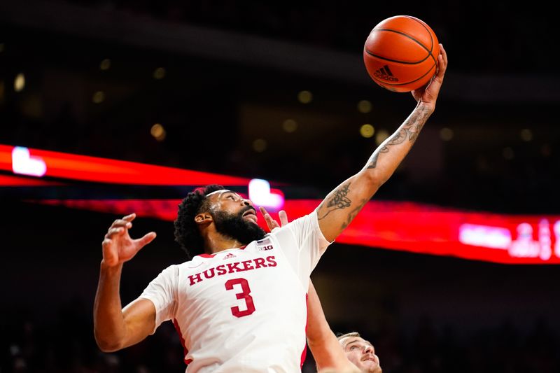 Dec 20, 2023; Lincoln, Nebraska, USA; Nebraska Cornhuskers guard Brice Williams (3) gets a rebound against the North Dakota Fighting Hawks during the second half at Pinnacle Bank Arena. Mandatory Credit: Dylan Widger-USA TODAY Sports