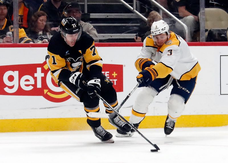 Apr 15, 2024; Pittsburgh, Pennsylvania, USA;  Pittsburgh Penguins center Evgeni Malkin (71) moves the puck against Nashville Predators defenseman Jeremy Lauzon (3) during the third period at PPG Paints Arena. The Penguins won 4-2. Mandatory Credit: Charles LeClaire-USA TODAY Sports