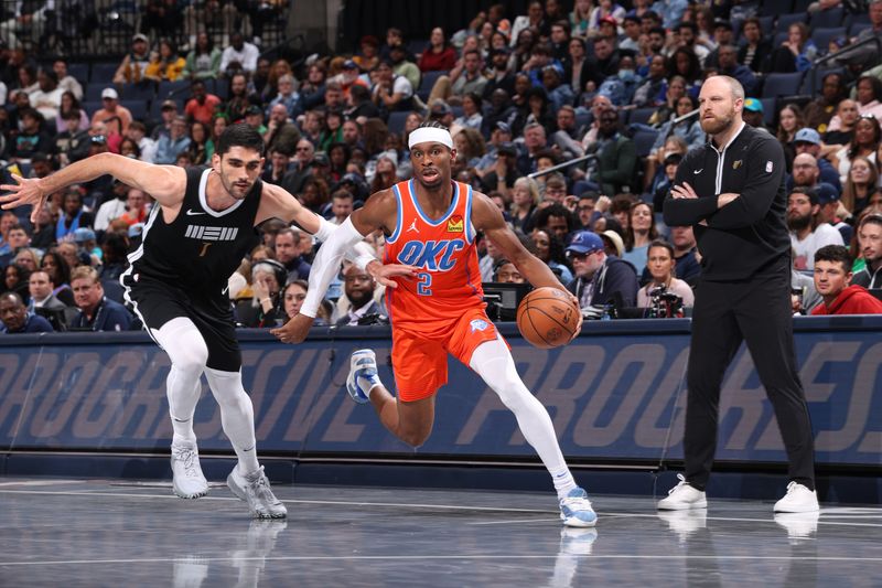 MEMPHIS, TN - MARCH 16:  Shai Gilgeous-Alexander #2 of the Oklahoma City Thunder handles the ball during the game against the Memphis Grizzlies on March 16, 2024 at FedExForum in Memphis, Tennessee. NOTE TO USER: User expressly acknowledges and agrees that, by downloading and or using this photograph, User is consenting to the terms and conditions of the Getty Images License Agreement. Mandatory Copyright Notice: Copyright 2024 NBAE (Photo by Joe Murphy/NBAE via Getty Images)
