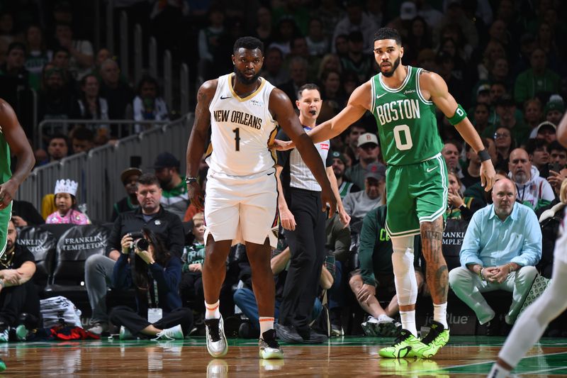 BOSTON, MA - JANUARY 12: Zion Williamson #1 of the New Orleans Pelicans and Jayson Tatum #0 of the Boston Celtics look on during the game on January 12, 2025 at TD Garden in Boston, Massachusetts. NOTE TO USER: User expressly acknowledges and agrees that, by downloading and/or using this Photograph, user is consenting to the terms and conditions of the Getty Images License Agreement. Mandatory Copyright Notice: Copyright 2025 NBAE (Photo by Brian Babineau/NBAE via Getty Images)