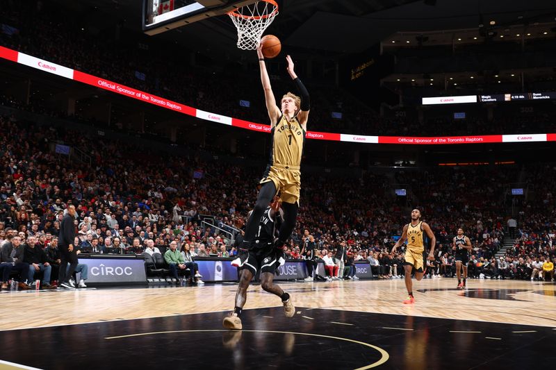 TORONTO, CANADA - FEBRUARY 22: Gradey Dick #1 of the Toronto Raptors drives to the basket during the game against the Brooklyn Nets on February 22, 2024 at the Scotiabank Arena in Toronto, Ontario, Canada.  NOTE TO USER: User expressly acknowledges and agrees that, by downloading and or using this Photograph, user is consenting to the terms and conditions of the Getty Images License Agreement.  Mandatory Copyright Notice: Copyright 2024 NBAE (Photo by Vaughn Ridley/NBAE via Getty Images)