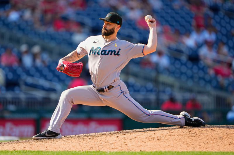 Sep 3, 2023; Washington, District of Columbia, USA;  Miami Marlins pitcher Tanner Scott (66) delivers a pitch against the Washington Nationals during the ninth inning at Nationals Park. Mandatory Credit: Gregory Fisher-USA TODAY Sports