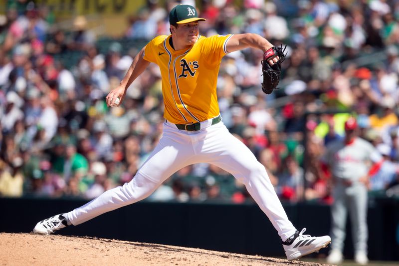 May 25, 2025; West Sacramento, California, USA; Athletics pitcher Mason Miller (19) delivers a pitch against the Philadelphia Phillies during the ninth inning at Sutter Health Park. Mandatory Credit: D. Ross Cameron-Imagn Images