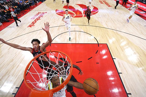 TORONTO, CANADA - DECEMBER 23:  Colin Sexton #2 of the Utah Jazz drives to the basket during the game against the Toronto Raptors on December 23, 2023 at the Scotiabank Arena in Toronto, Ontario, Canada.  NOTE TO USER: User expressly acknowledges and agrees that, by downloading and or using this Photograph, user is consenting to the terms and conditions of the Getty Images License Agreement.  Mandatory Copyright Notice: Copyright 2023 NBAE (Photo by Vaughn Ridley/NBAE via Getty Images)