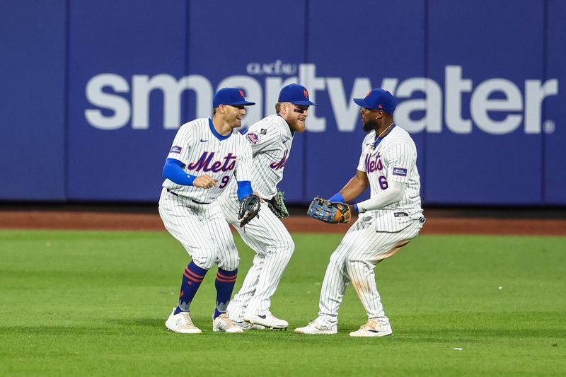 May 30, 2024; New York City, New York, USA;  New York Mets outfielders Brandon Nimmo (9), Harrison Bader (44) and Starling Marte (6) celebrate after defeating the Arizona Diamondbacks 3-2 at Citi Field. Mandatory Credit: Wendell Cruz-USA TODAY Sports