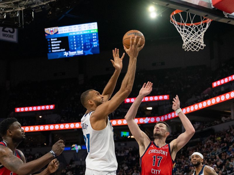 MINNEAPOLIS, MINNESOTA - MARCH 19: Rudy Gobert #27 of the Minnesota Timberwolves goes up for a layup against the New Orleans Pelicans at Target Center on March 19, 2025 in Minneapolis, Minnesota. NOTE TO USER: User expressly acknowledges and agrees that, by downloading and or using this photograph, User is consenting to the terms and conditions of the Getty Images License Agreement. (Photo by Ben Brewer/Getty Images)