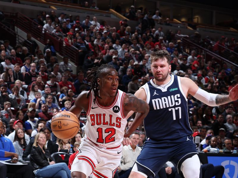 CHICAGO, IL - MARCH 11: Ayo Dosunmu #12 of the Chicago Bulls drives to the basket during the game against the Dallas Mavericks on March 11, 2024 at United Center in Chicago, Illinois. NOTE TO USER: User expressly acknowledges and agrees that, by downloading and or using this photograph, User is consenting to the terms and conditions of the Getty Images License Agreement. Mandatory Copyright Notice: Copyright 2024 NBAE (Photo by Jeff Haynes/NBAE via Getty Images)