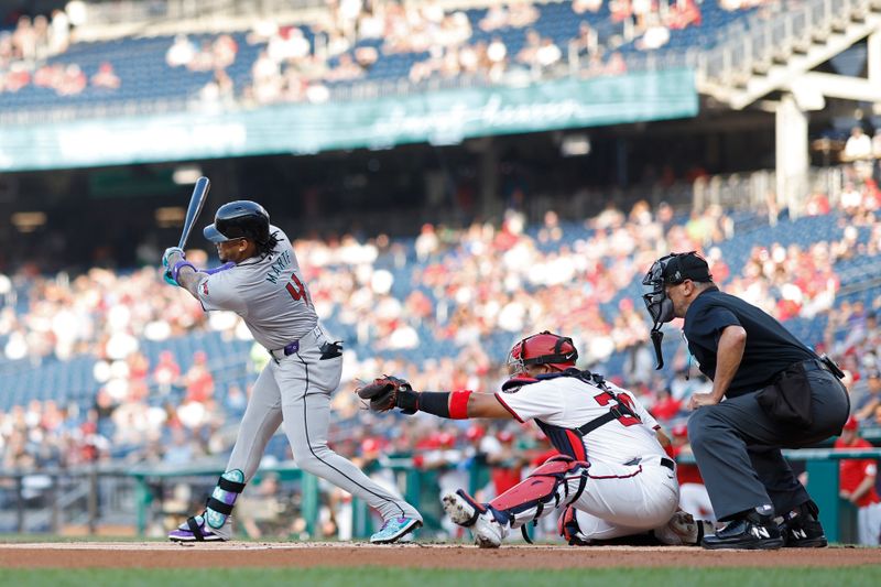 Jun 18, 2024; Washington, District of Columbia, USA; Arizona Diamondbacks second baseman Ketel Marte (4) hits a two run home run against the Washington Nationals during the first inning during the first inning at Nationals Park. Mandatory Credit: Geoff Burke-USA TODAY Sports