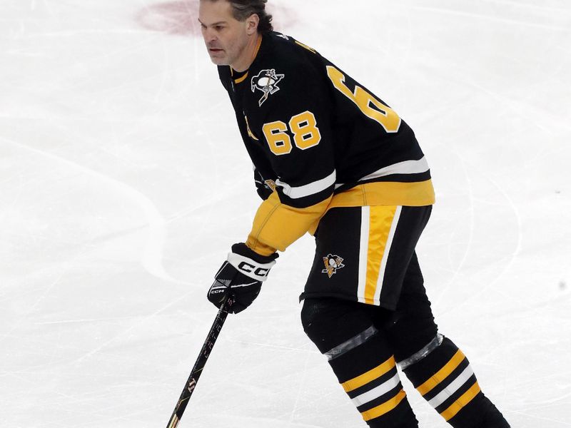 Feb 18, 2024; Pittsburgh, Pennsylvania, USA;  Pittsburgh Penguins former right wing Jaromir Jagr (68) skates in  warm-ups against the Los Angeles Kings at PPG Paints Arena. Mandatory Credit: Charles LeClaire-USA TODAY Sports