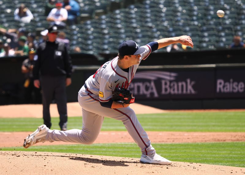 May 31, 2023; Oakland, California, USA; Atlanta Braves  starting pitcher Jared Shuster (45) pitches the ball against the against the Oakland Athletics during the first inning at Oakland-Alameda County Coliseum. Mandatory Credit: Kelley L Cox-USA TODAY Sports