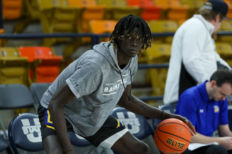 Jan 30, 2024; Logan, Utah, USA; San Jose State Spartans center Adrame Diongue (4) warms up before the game against the Utah State Aggies at Dee Glen Smith Spectrum. Mandatory Credit: Rob Gray-USA TODAY Sports