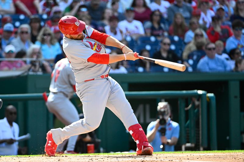 May 10, 2025; Washington, District of Columbia, USA; St. Louis Cardinals catcher Pedro Pages (43) hits a RBI single against the Washington Nationals during the second inning at Nationals Park. Mandatory Credit: Brad Mills-Imagn Images
