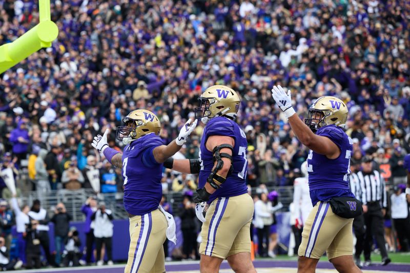 Nov 11, 2023; Seattle, Washington, USA; Washington Huskies running back Dillon Johnson (7) celebrates after scoring a touchdown against the Utah Utes during the first half at Alaska Airlines Field at Husky Stadium. Mandatory Credit: Steven Bisig-USA TODAY Sports