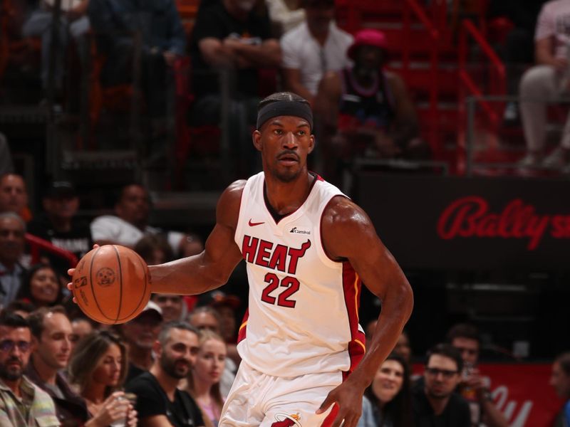 MIAMI, FL - MARCH 29: Jimmy Butler #22 of the Miami Heat dribbles the ball during the game against the Portland Trail Blazers on March 29, 2024 at Kaseya Center in Miami, Florida. NOTE TO USER: User expressly acknowledges and agrees that, by downloading and or using this Photograph, user is consenting to the terms and conditions of the Getty Images License Agreement. Mandatory Copyright Notice: Copyright 2024 NBAE (Photo by Issac Baldizon/NBAE via Getty Images)