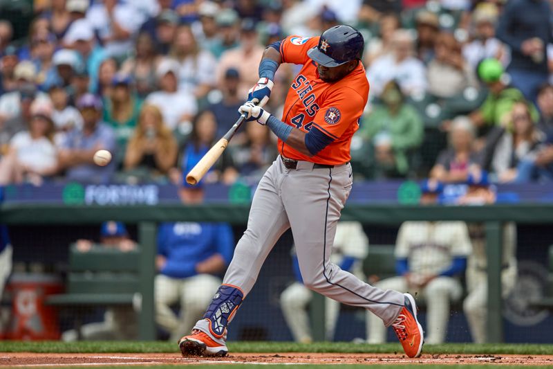 Jul 21, 2024; Seattle, Washington, USA; Houston Astros designated hitter Yordan Alvarez (44) hits a single against the Seattle Mariners during the first inning at T-Mobile Park. Mandatory Credit: John Froschauer-USA TODAY Sports