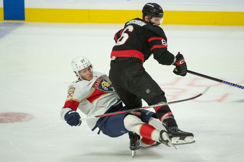 Nov 27 2023; Ottawa, Ontario, CAN; Florida Panthers center Eetu Luostarinen (27) is checked by Ottawa Senators defenseman Jakob Chychrun (6) in the third period at the Canadian Tire Centre. Mandatory Credit: Marc DesRosiers-USA TODAY Sports