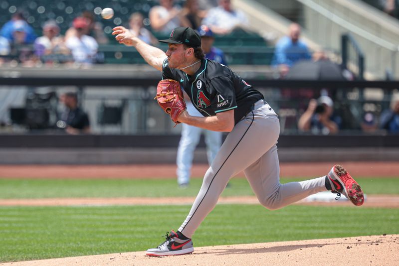 Jun 2, 2024; New York City, New York, USA;  Arizona Diamondbacks starting pitcher Brandon Pfaadt (32) delivers a pitch during the first inning against the New York Mets at Citi Field. Mandatory Credit: Vincent Carchietta-USA TODAY Sports