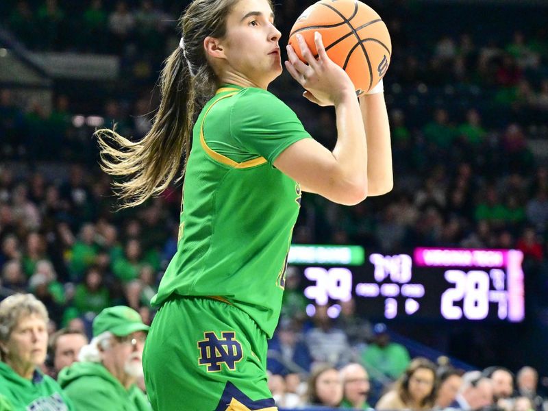 Feb 29, 2024; South Bend, Indiana, USA; Notre Dame Fighting Irish guard Sonia Citron (11) shoots a three point basket in the second half against the Virginia Tech Hokies at the Purcell Pavilion. Mandatory Credit: Matt Cashore-USA TODAY Sports